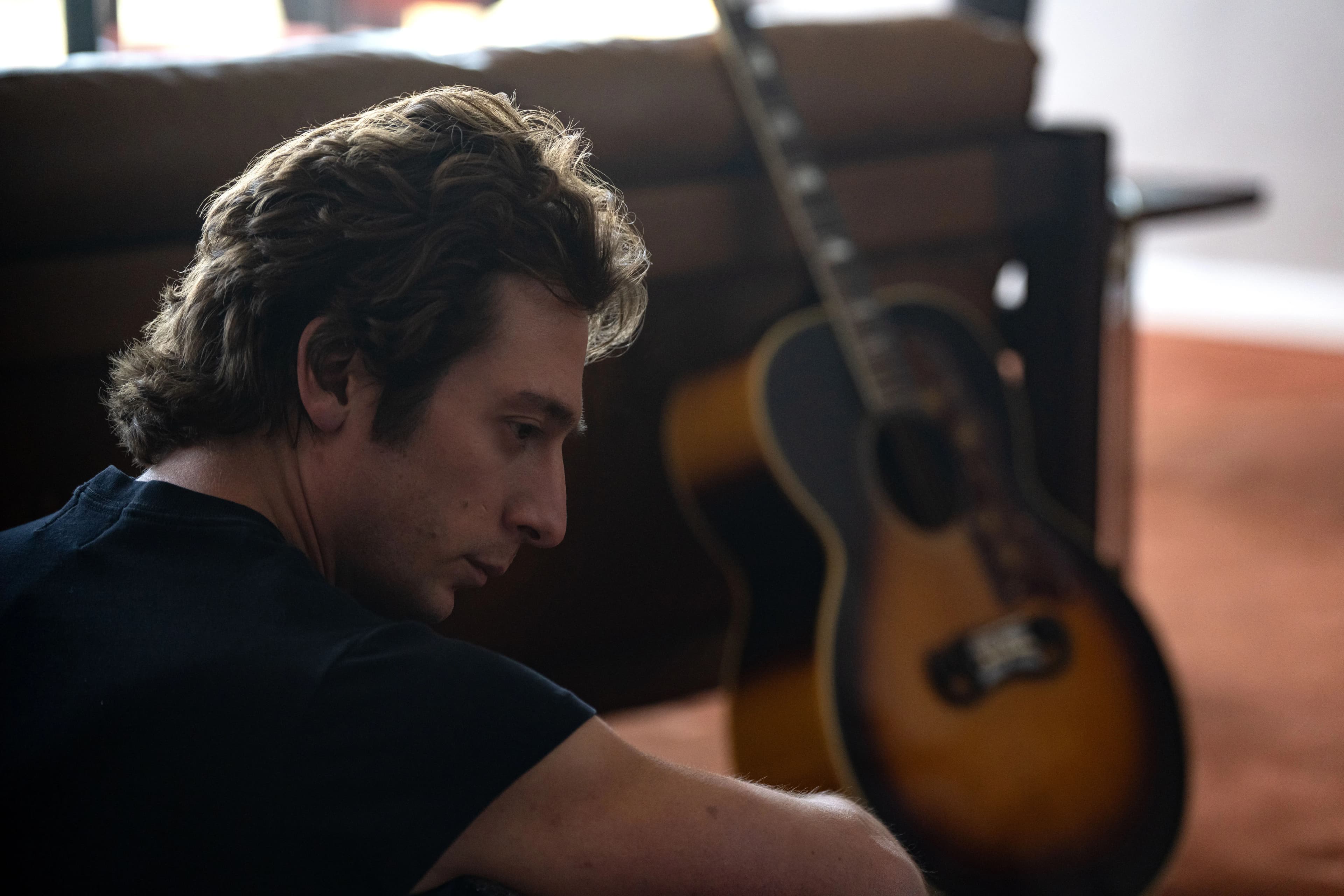Actor Jeremy Allen White as Bruce Springsteen in a still from "Deliver Me From Nowhere." 
