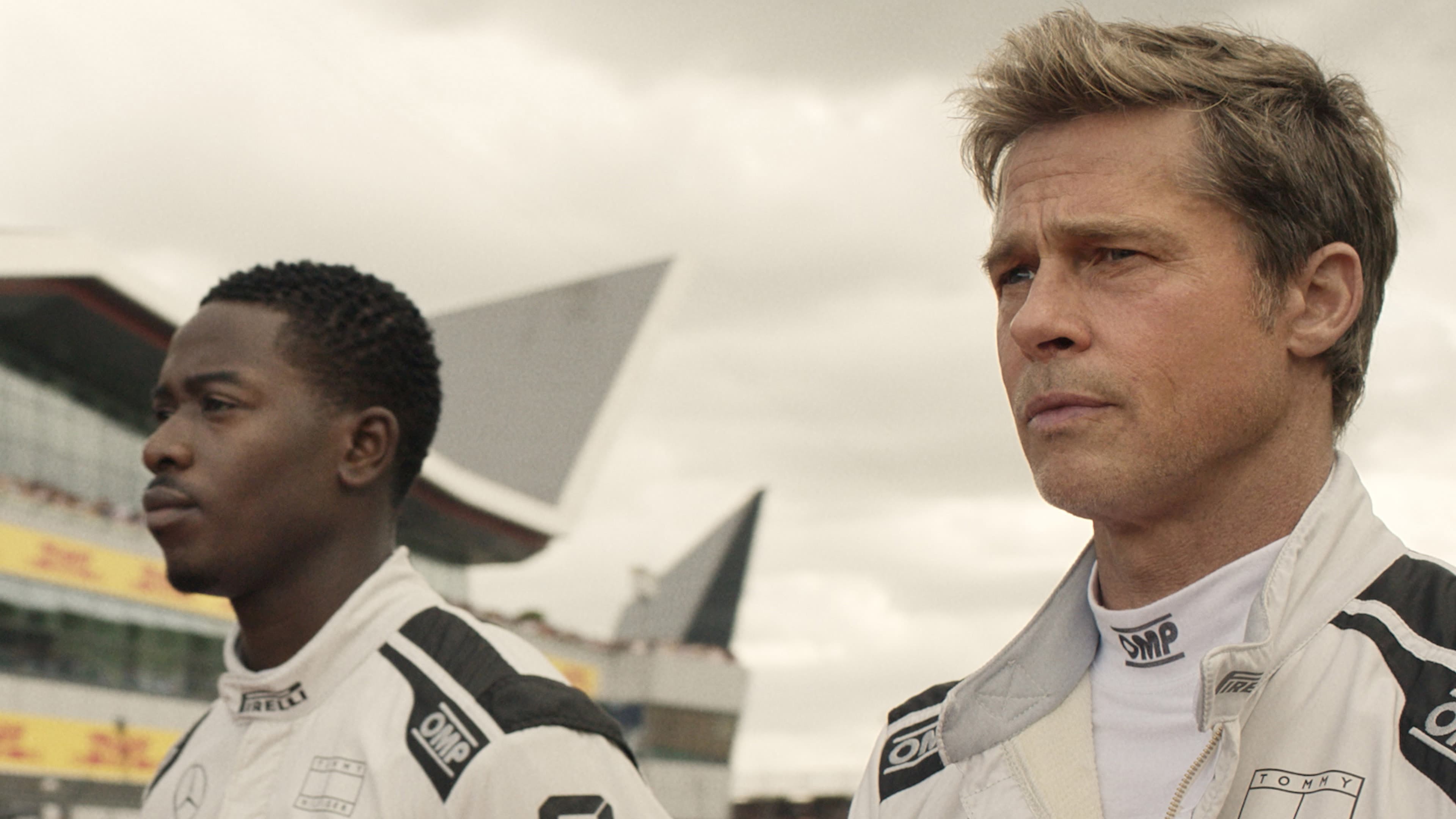 Damson Idris as Joshua Pearce and Brad Pitt as Sonny Hayes in Apple Original Films’ "F1 The Movie."