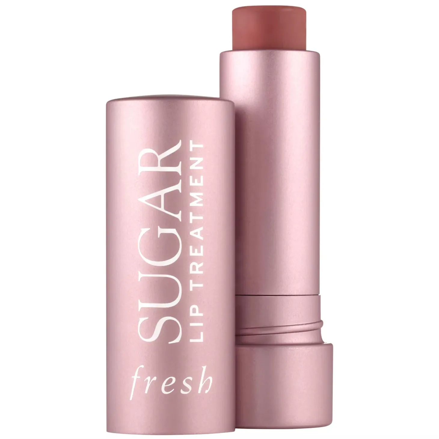 A tube of the Fresh Tinted LIp Balm in a rosy-pink shade against a white background 