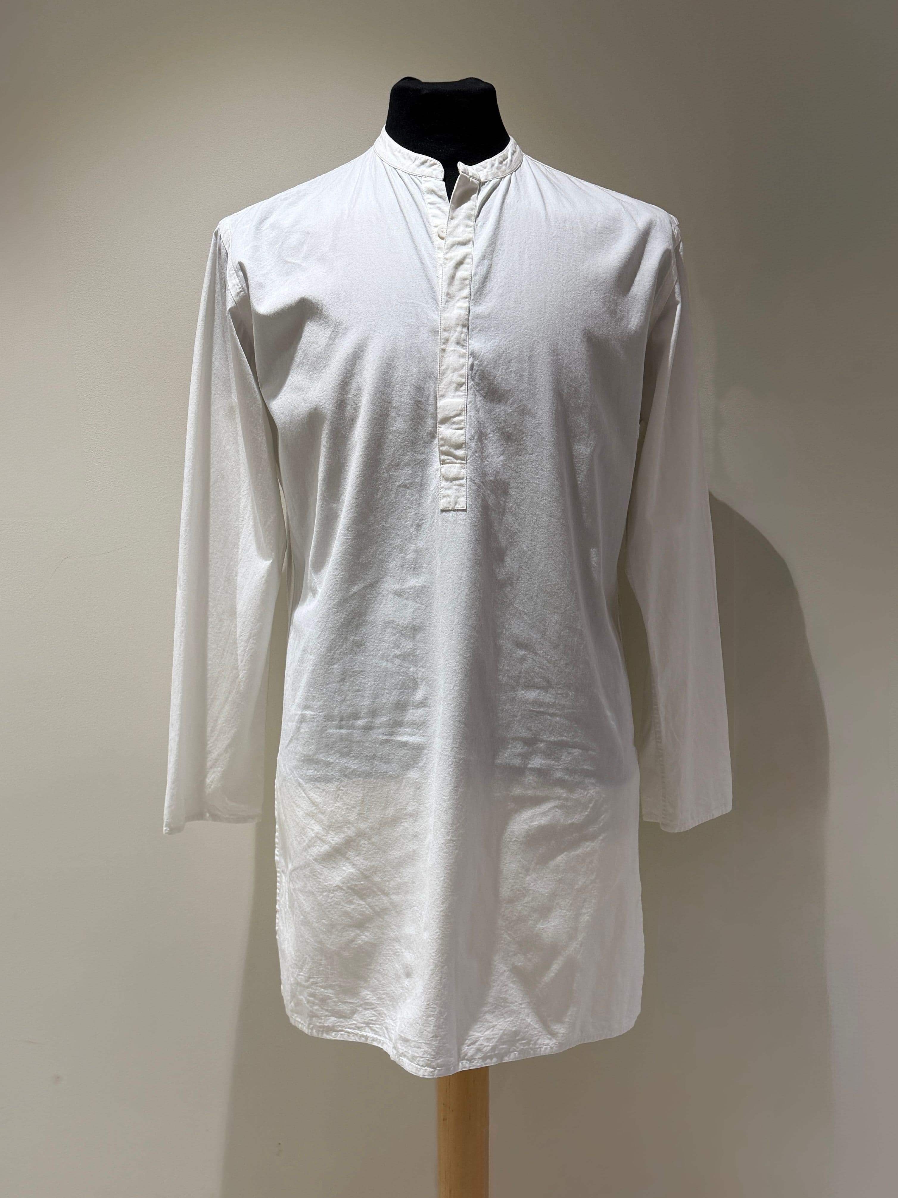 Hamlet's kurta begins bright white.