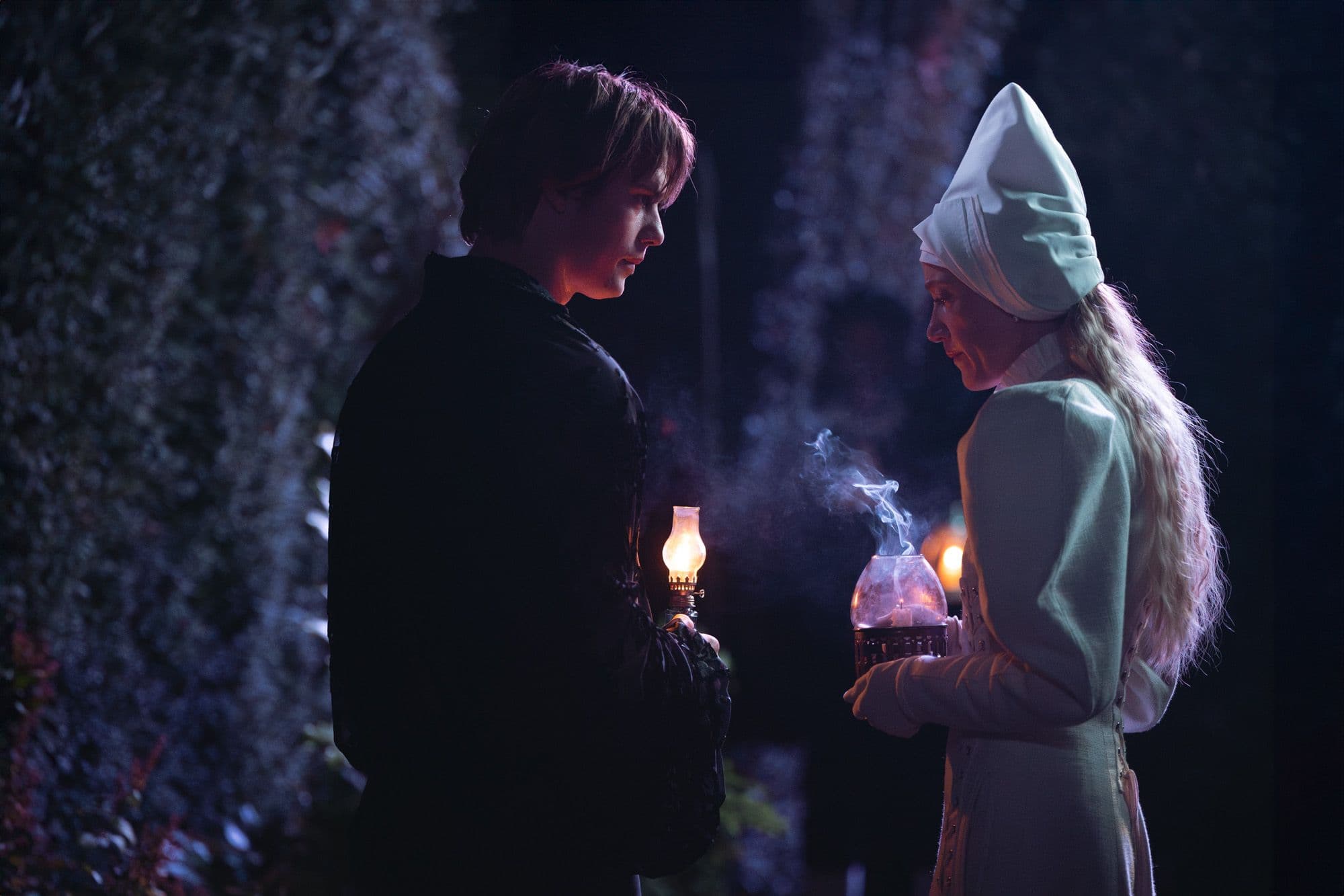 Nicholas Galitzine and Maika Monroe meeting outside in "100 Nights of Hero."
