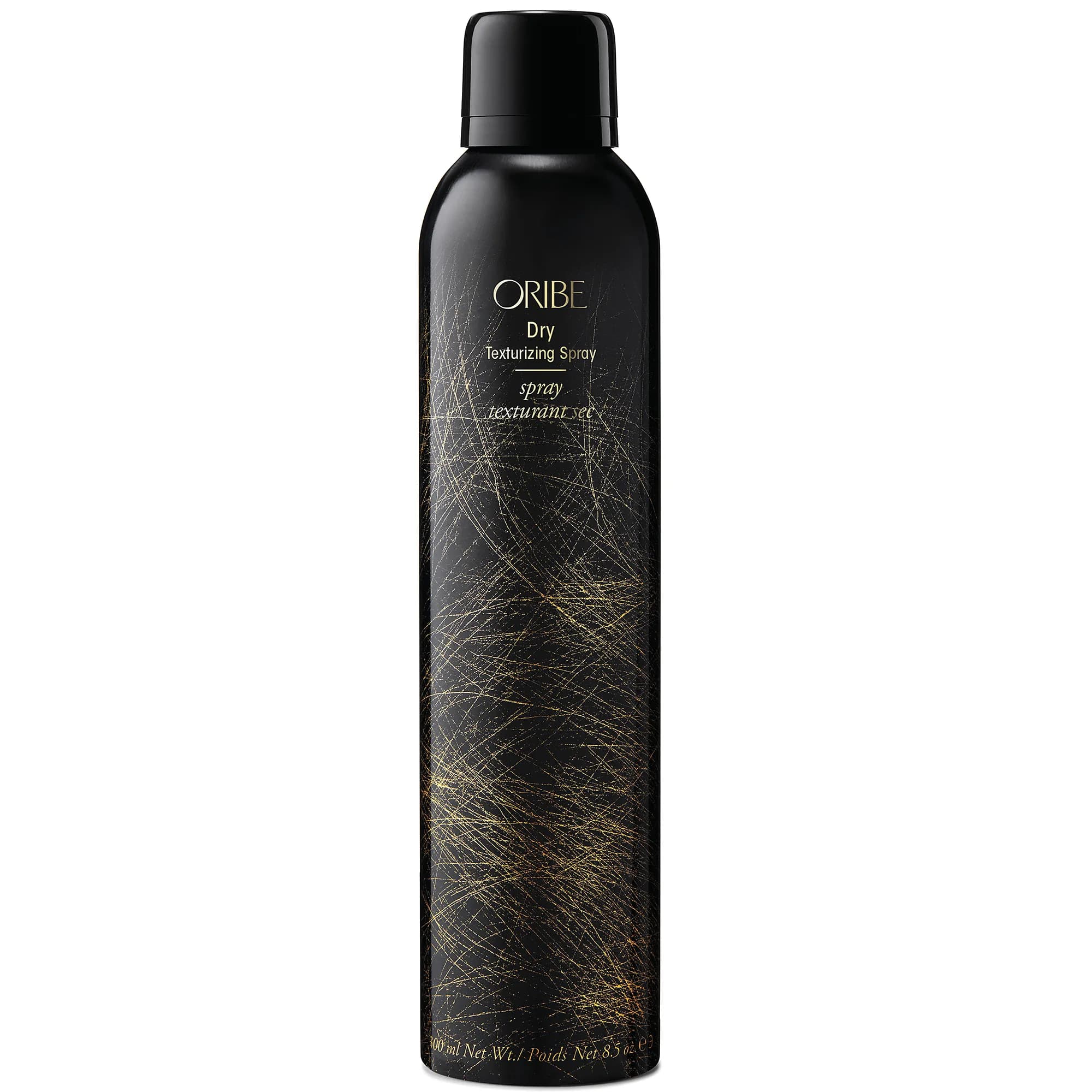 A black-and-gold spray bottle of Oribe texturizing spray against a white background
