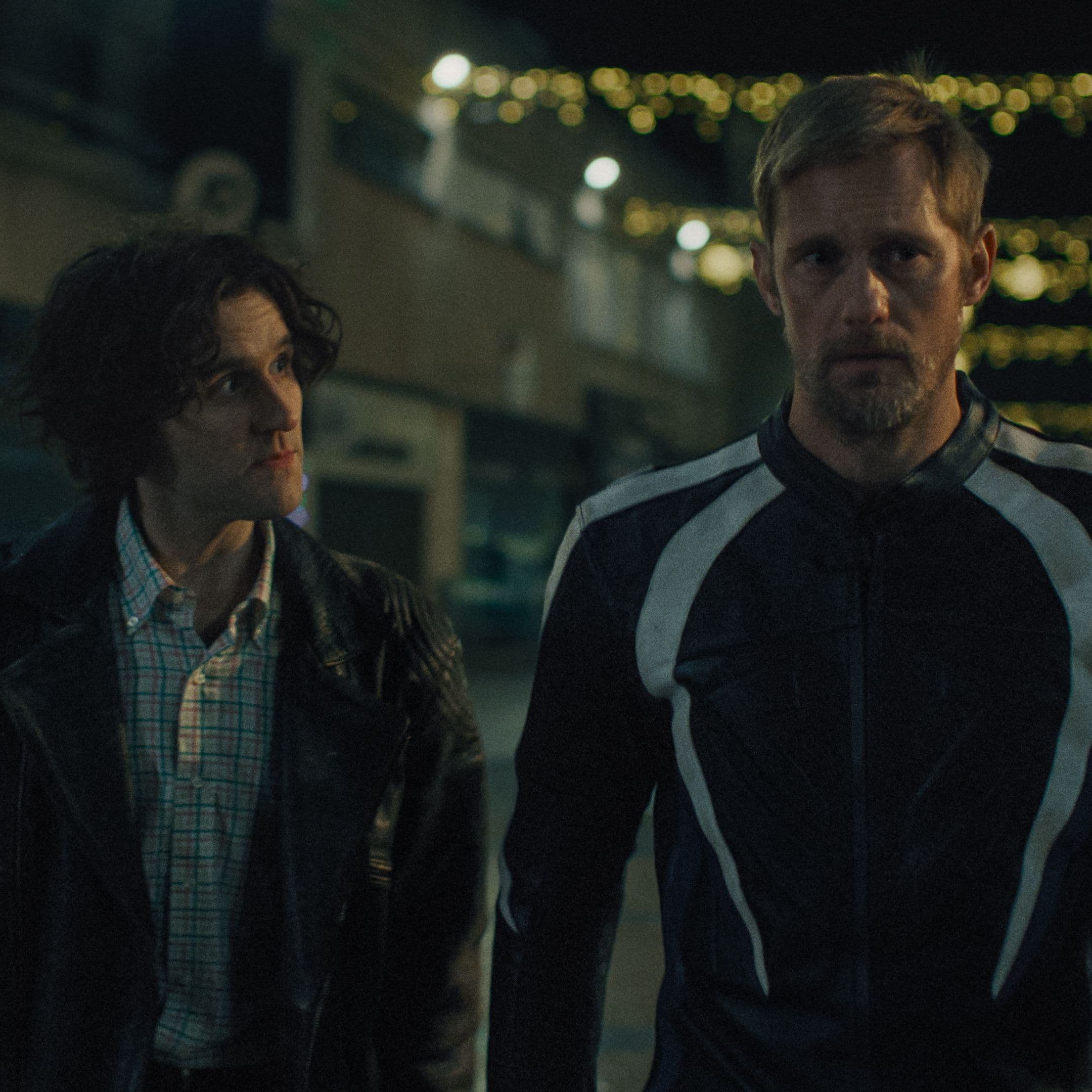 Harry Melling and Alexander Skarsgård in "Pillion."